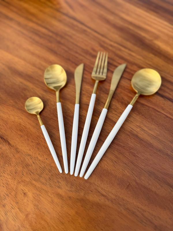 Gold and white cutlery: Gold cutlery with white handles