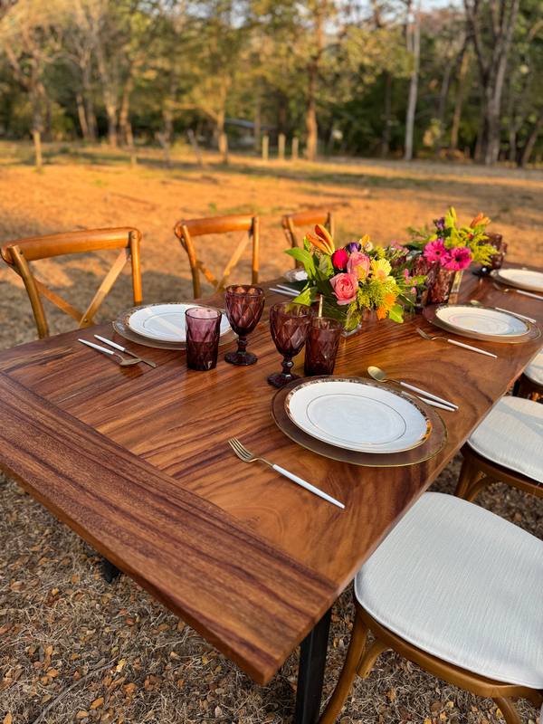 Guanacaste table: Handmade guanacaste wood table with steel legs, styled at an event