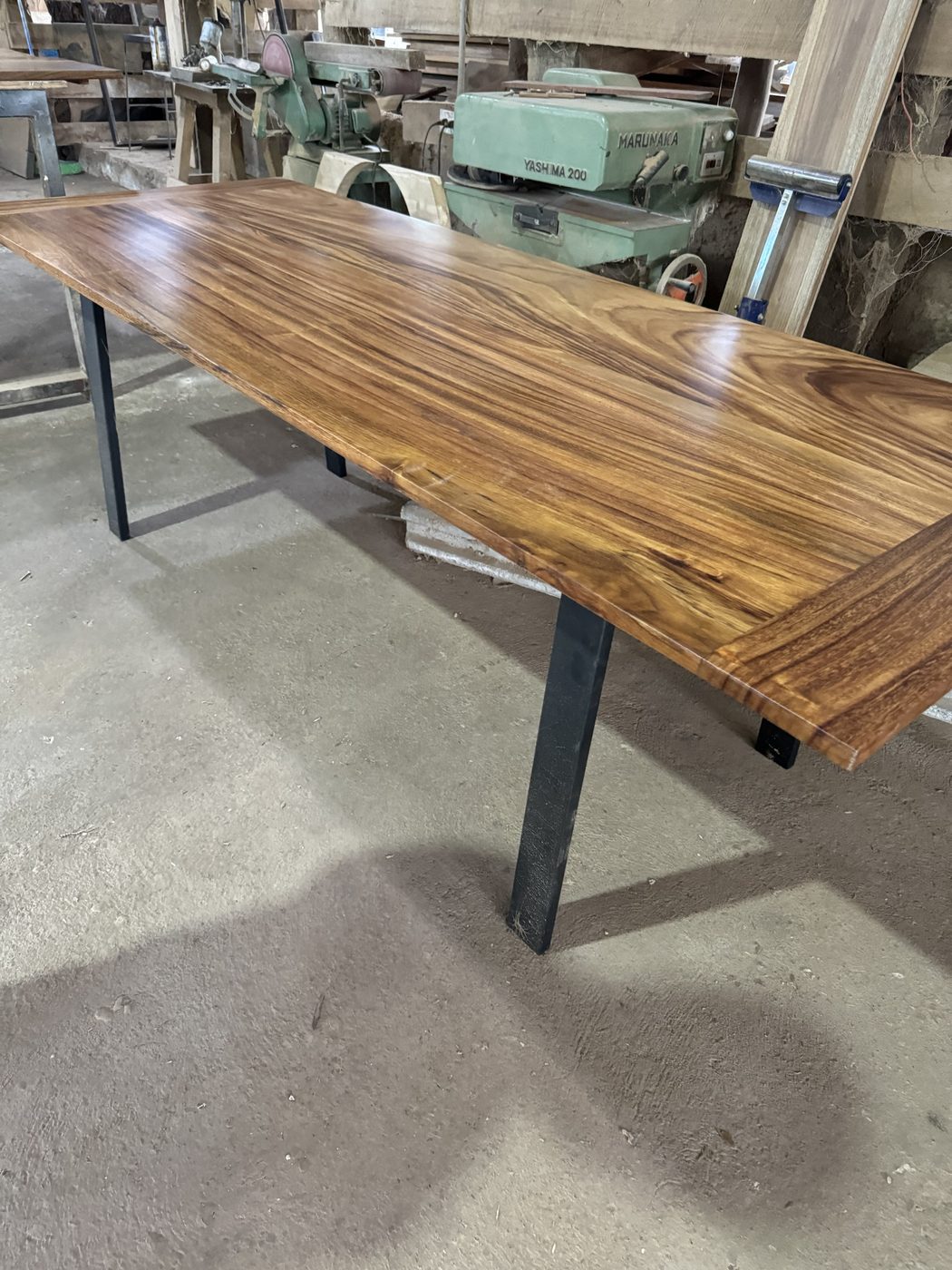Guanacaste table: Guanacaste top on black steel legs