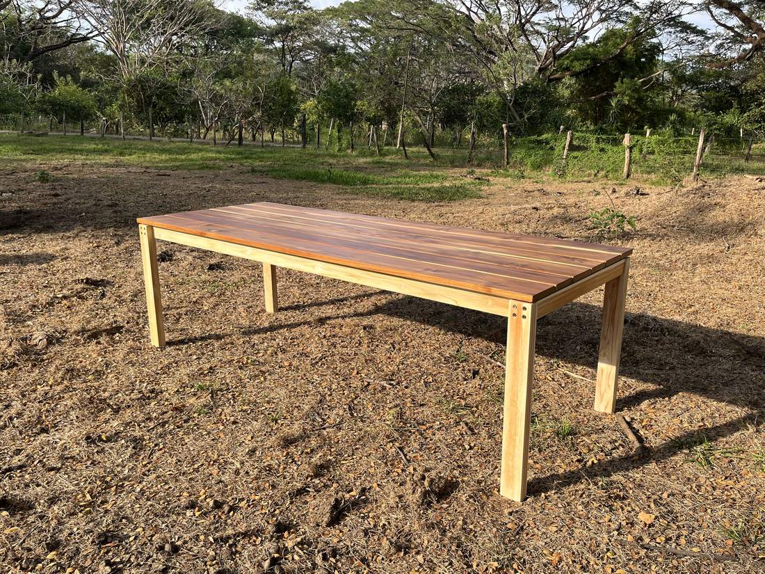 Teak table: Handmade teak wood table, photographed outdoors in Nicoya